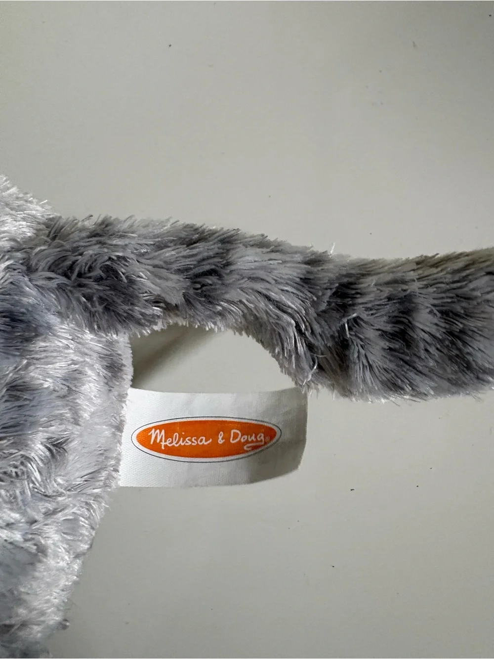 Melissa & Doug Greycie Tabby Cat, featuring soft grey and white patterned fur